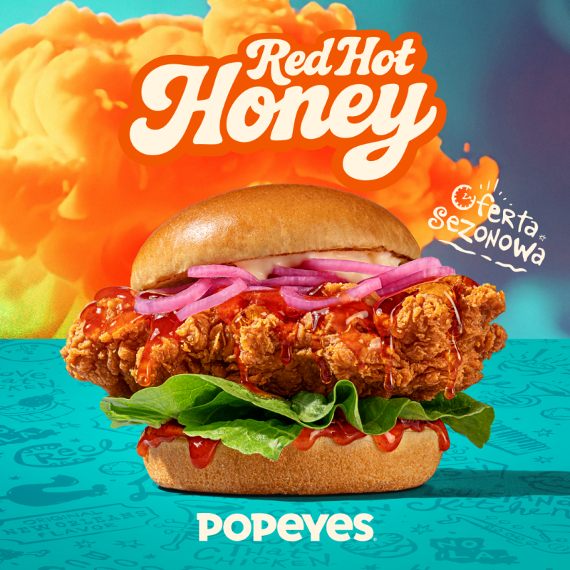 Chrupiące kawałki kurczaka Popeyes w miodowo-ostrym sosie Red Hot Honey.