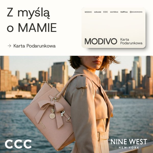 Stylowa kobieta w czarnych okularach i eleganckiej biżuterii trzyma prezent CCC MODIVO