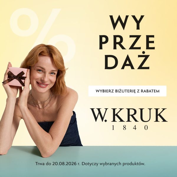 Plakat promocyjny marki W.KRUK przedstawia uśmiechniętą, rudowłosą kobietę trzymającą małe różowe pudełeczko z prezentem na jasnym, pastelowym tle. Po prawej stronie umieszczono duże napisy „WYPRZEDAŻ” oraz hasło „WYBIERZ BIŻUTERIĘ Z RABATEM” wraz z logo marki i informacją o dacie zakończenia akcji.